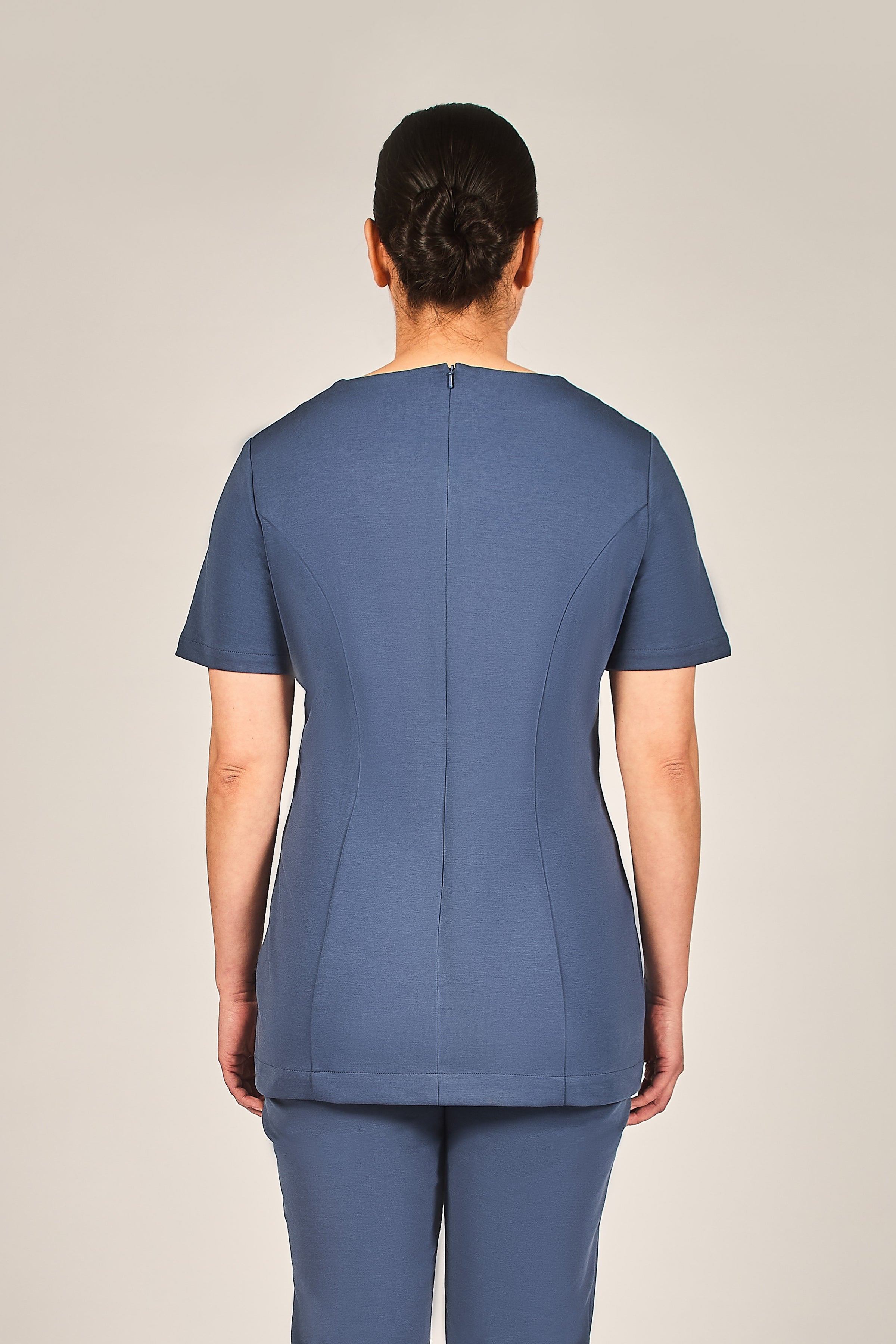 Hotel staff blue tunic